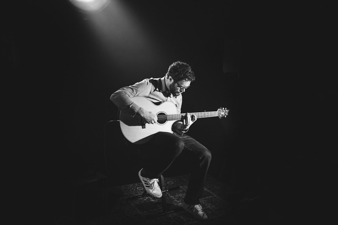 singer on stage with guitar